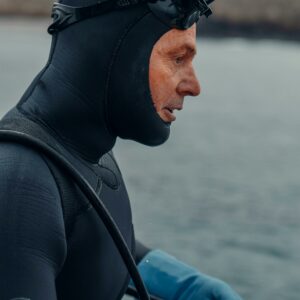 Man in Black Wetsuit Wearing Black Goggles